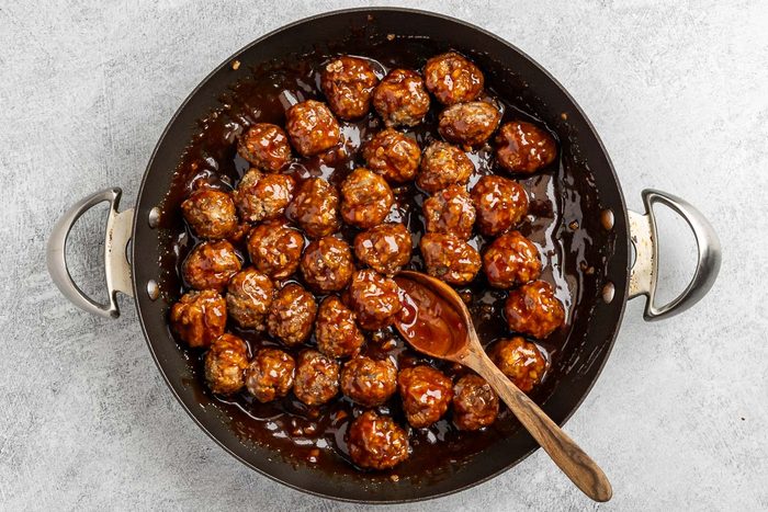 cooked meatballs coated with the glaze.