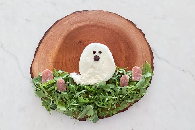 A plate with a white object on it.