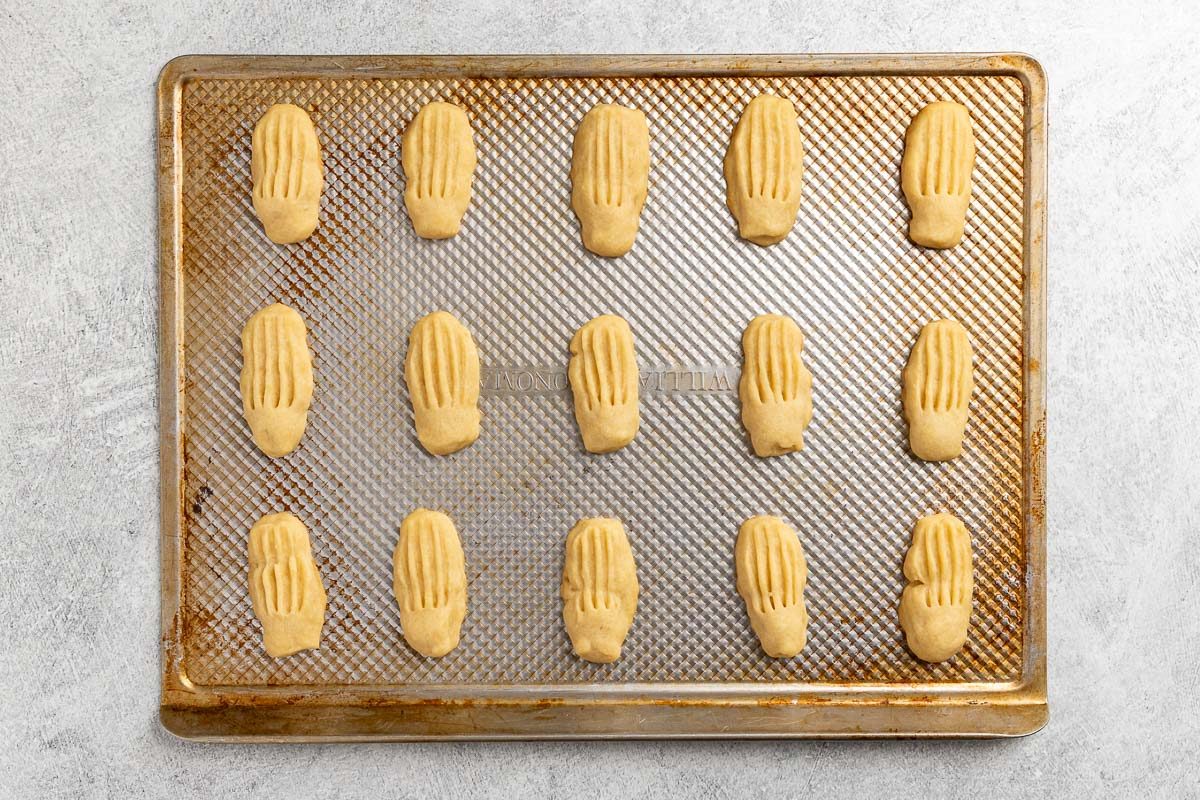 shaped and baked cookies on a baking sheet.