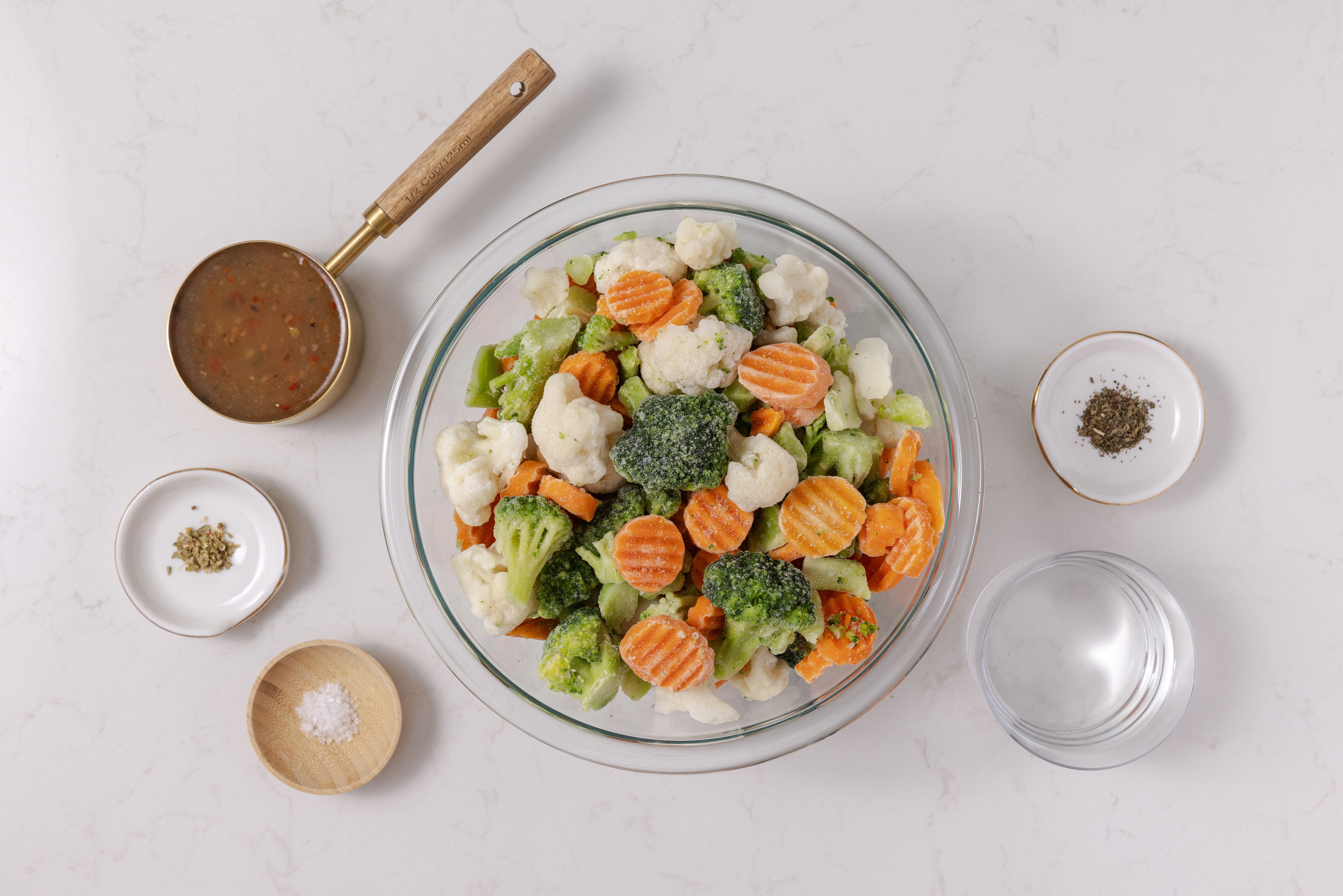 Ingredients for italian vegetables on kitchen counter.