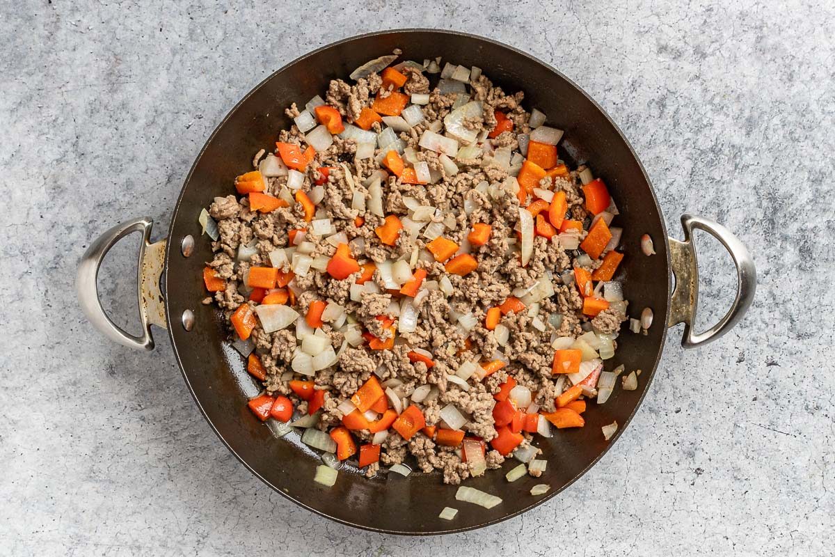 Taste of Home Keto Taco Casserole photo of the cooked beef, pepper, and onion.