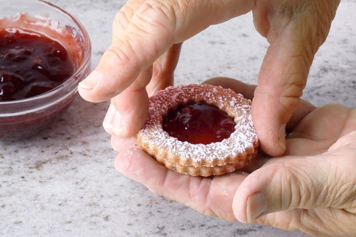Sandwiched Linzer Cookies with jam is centre