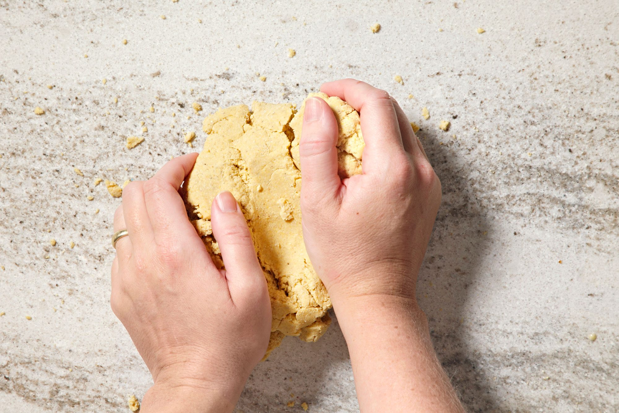 Knead until mixture forms a smooth ball,