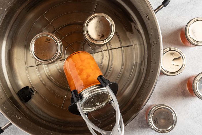 processing the jars in a water canner.