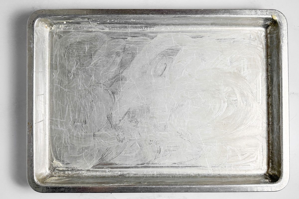 Greased baking sheet for Taste of Home Pecan Brittle