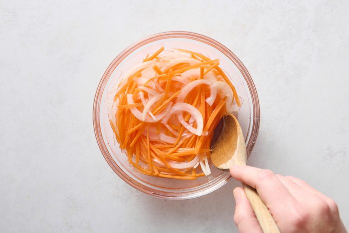 Pickling the carrots and onions