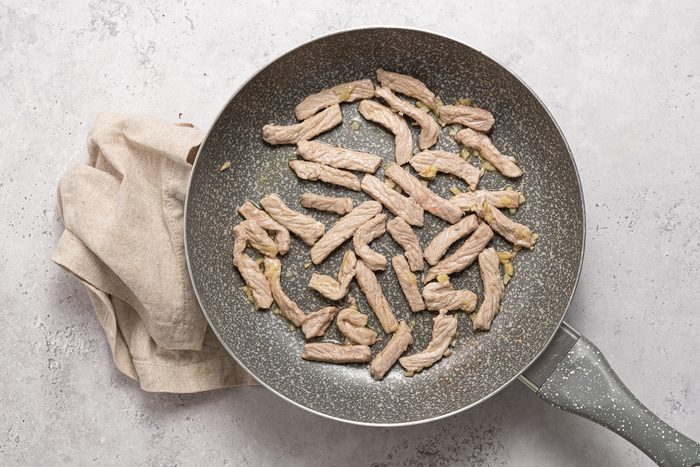 Pork Strips In Pan With Ginger And Garlic