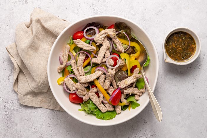Bowl With Gren Leaf Salad, Pepper, Onion And Grape Tomatoes
