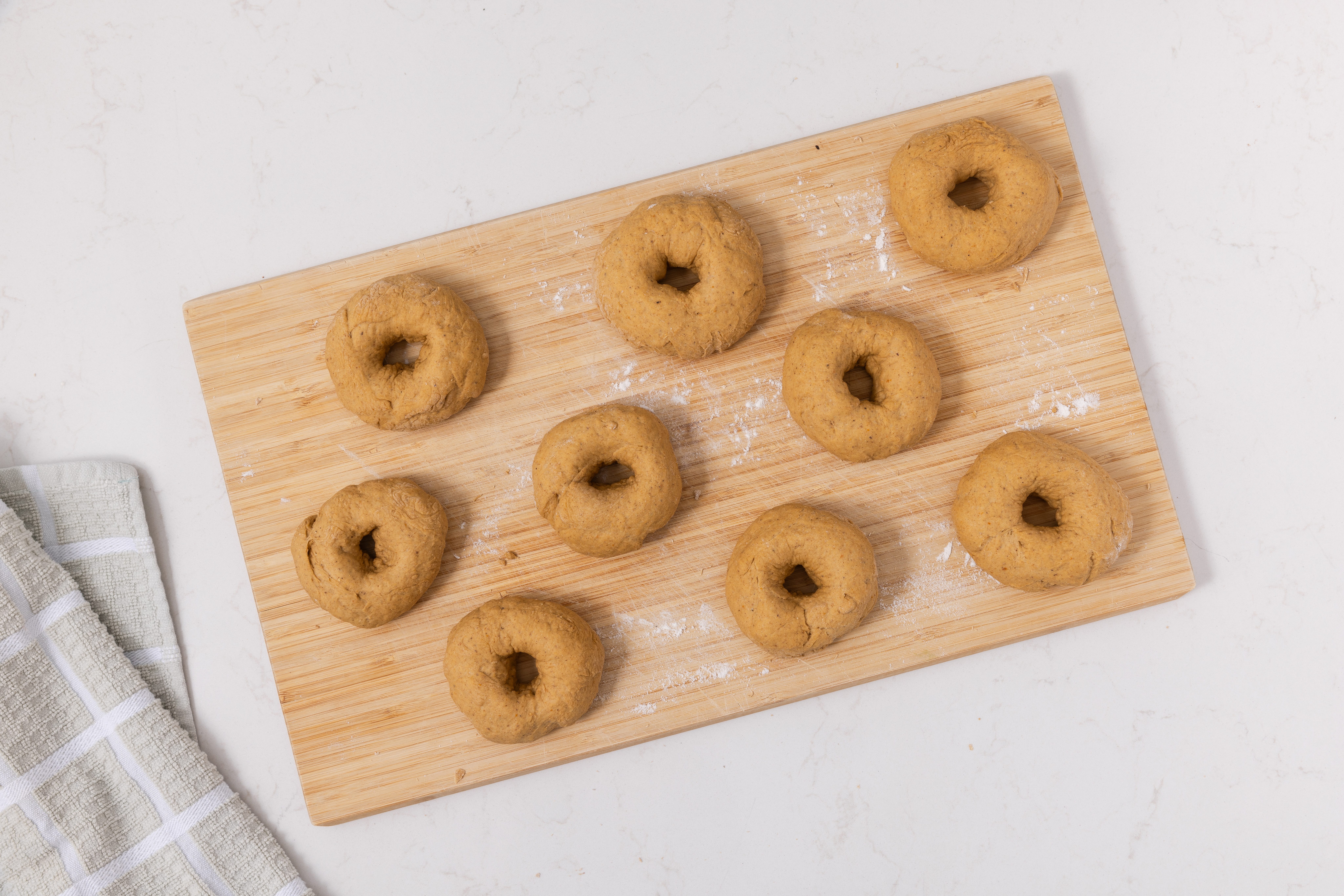 Bagels cut and shapped.