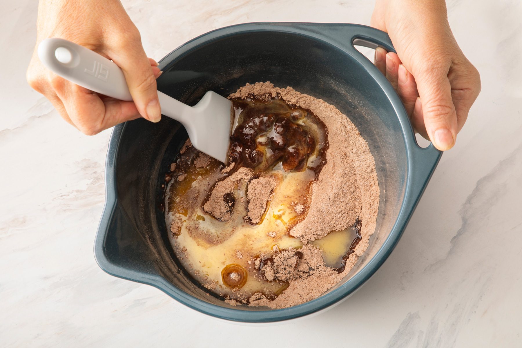 In a large bowl, mix sugar, all-purpose flour, baking cocoa, salt and baking soda
