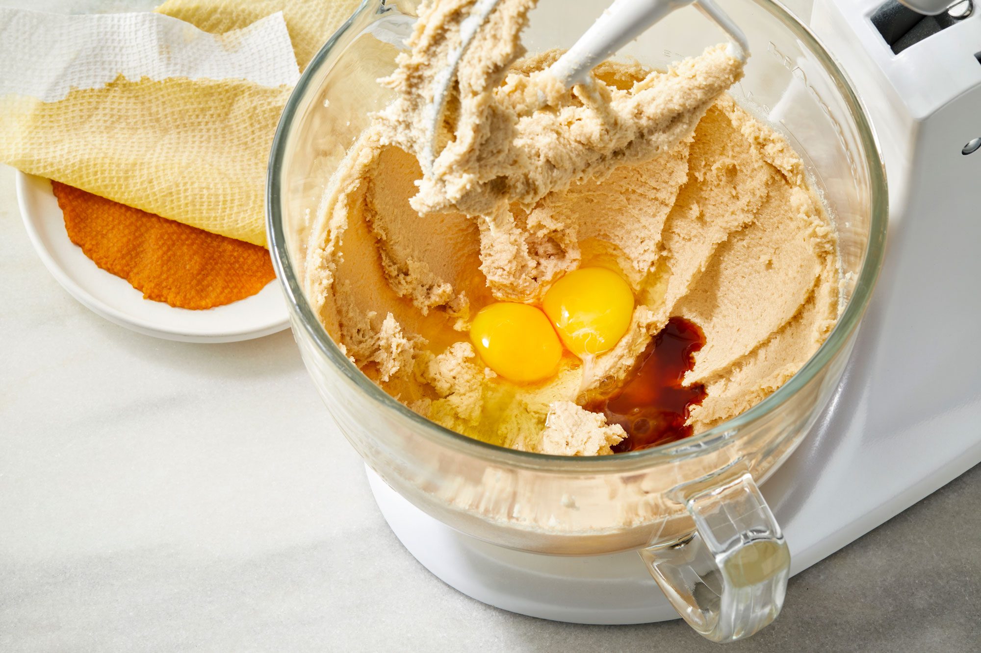 Beat in the eggs and vanilla