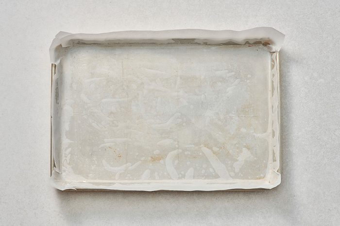 Baking pan lined with greased parchment paper