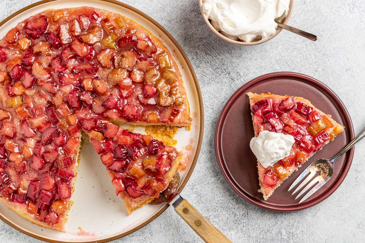 the finished Rhubarb Upside Down Cake cut into slices and served on plates.