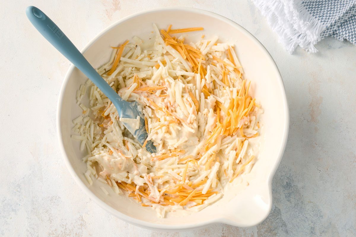 Stir In Hash Browns And 1 Cup Shredded Cheese Until Combined.