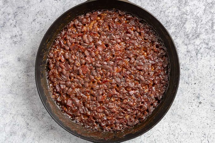 Taste of Home Smoked Baked Beans photo of the smoked baked beans in the skillet.