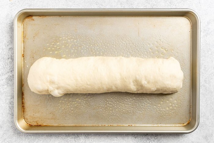 Taste of Home Spinach Bread photo of rolling out the dough.