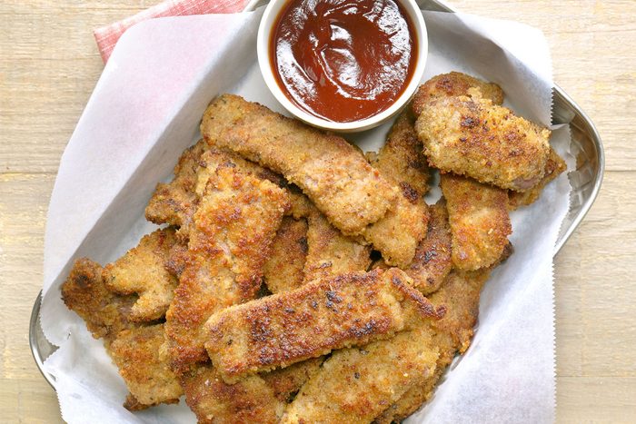 Steak fingers served with sauce on the side