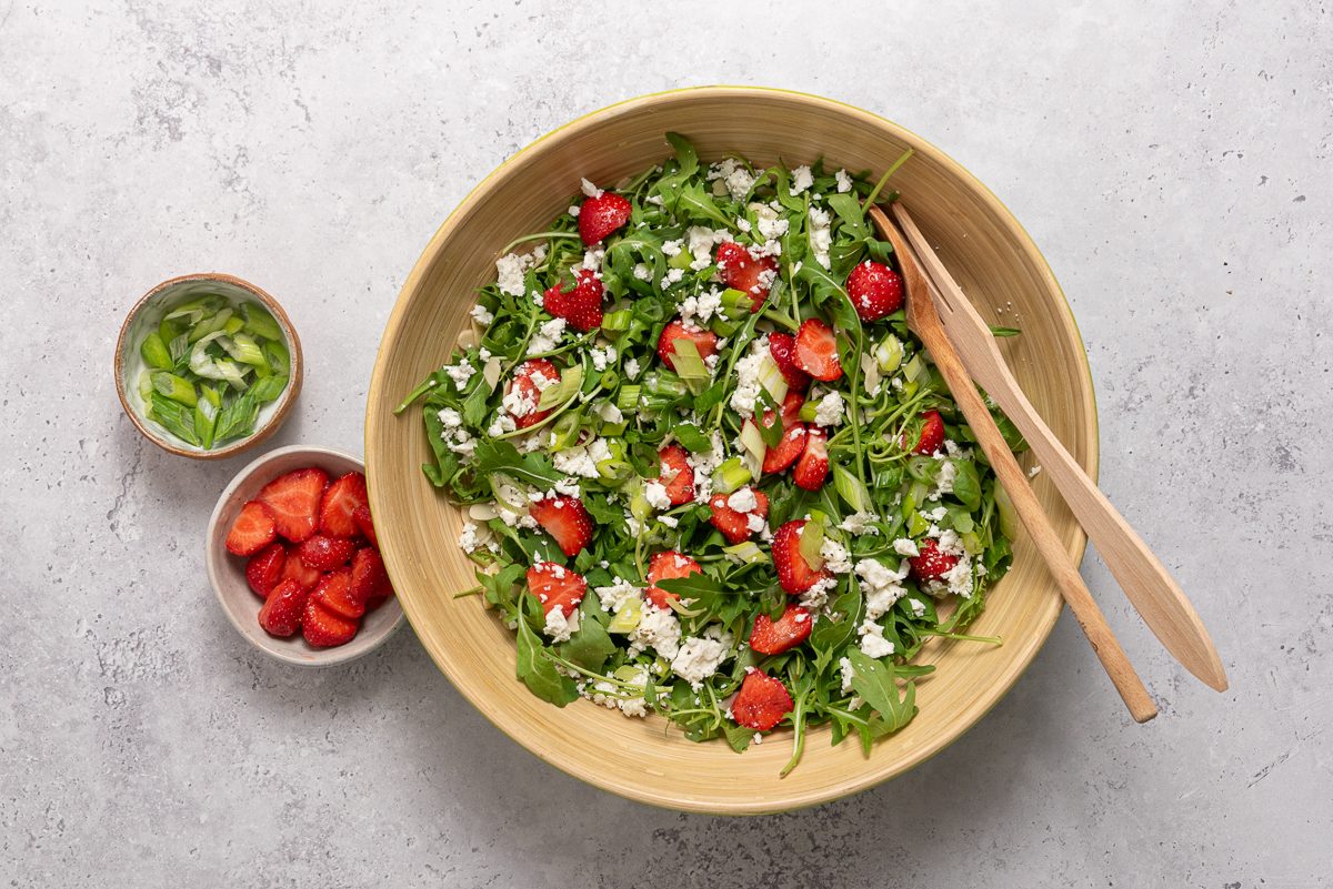 Bowls With Arugula, Strawberries, Feta Cheese And Green Onion