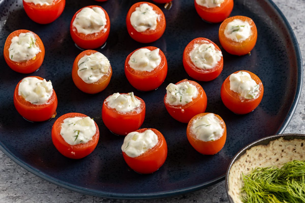 Taste of Home Stuffed Cherry Tomatoes photo of the finished recipe on a serving platter.