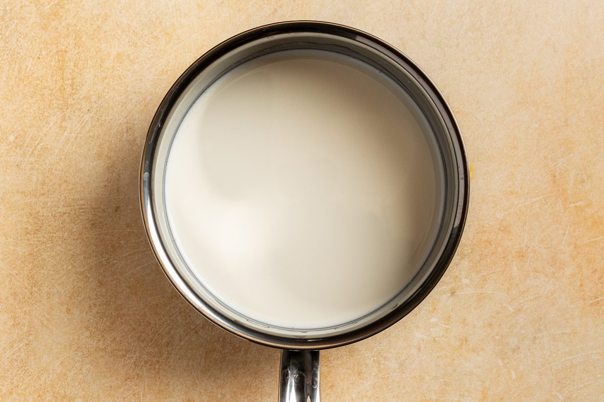 Taste of Home Sweet Potato Puree photo of heating the milk and cream.