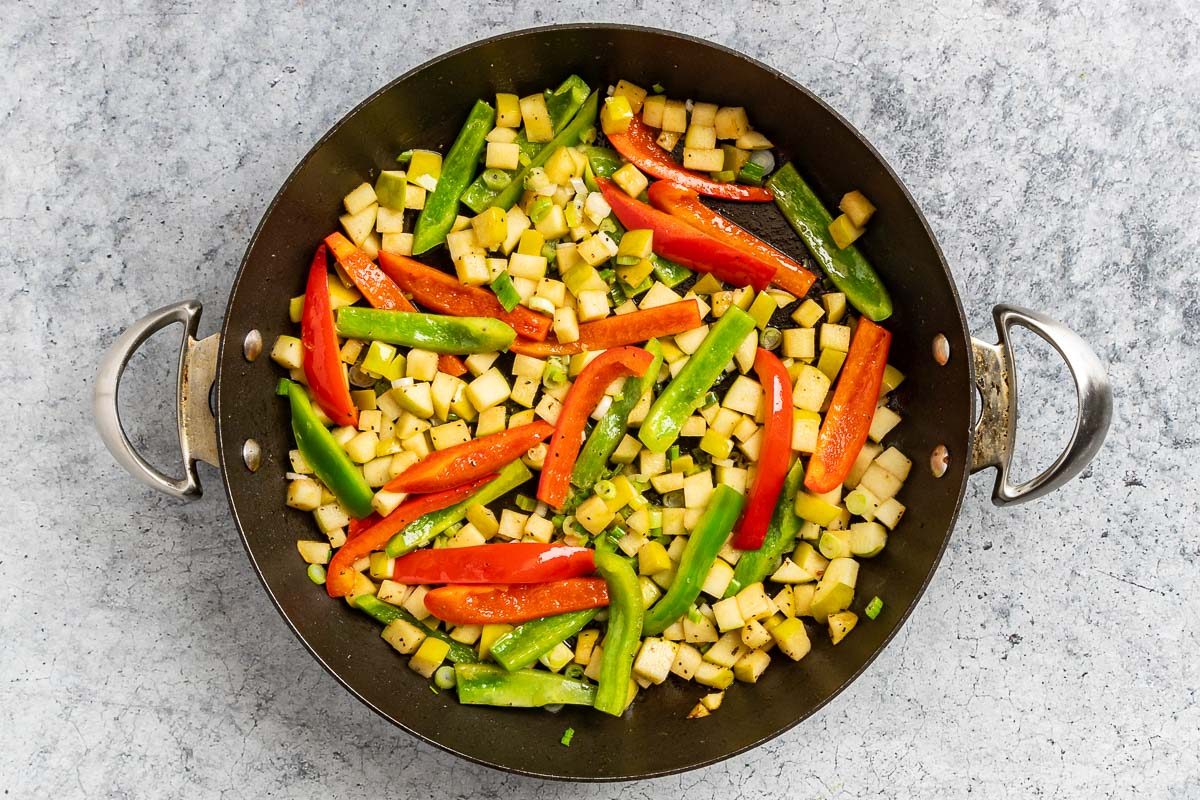 Taste of Home Sweet and Sour Beef photo of the cooked veggies and apples.