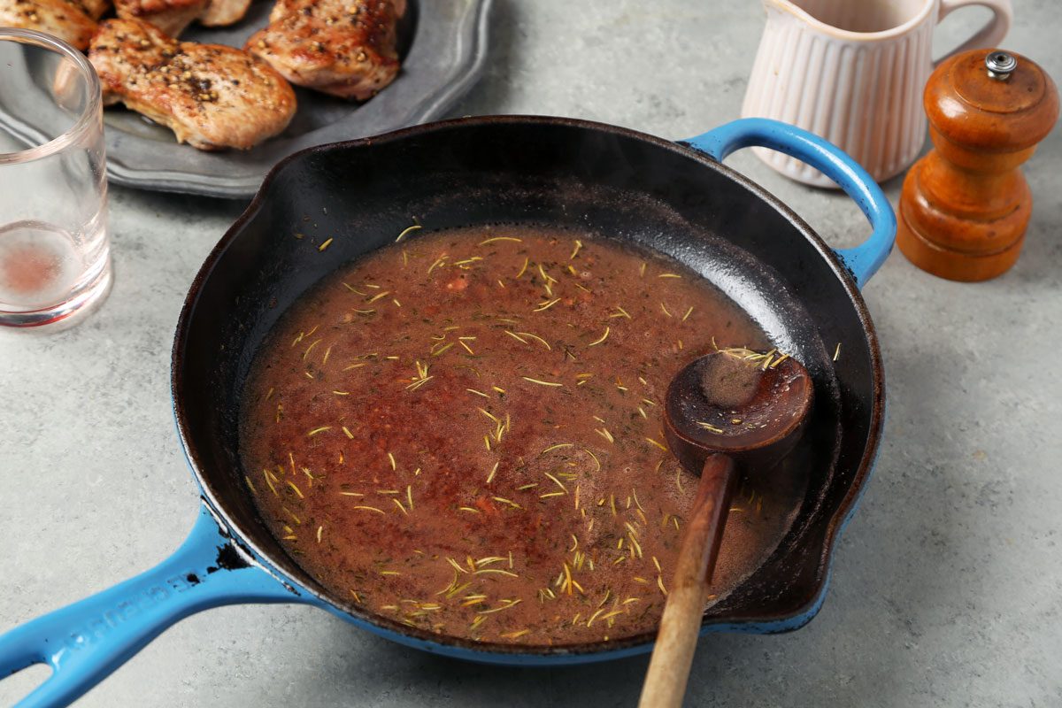 Process of making Taste of Home's Pork and Red Wine Sauce on a grey marble surface.