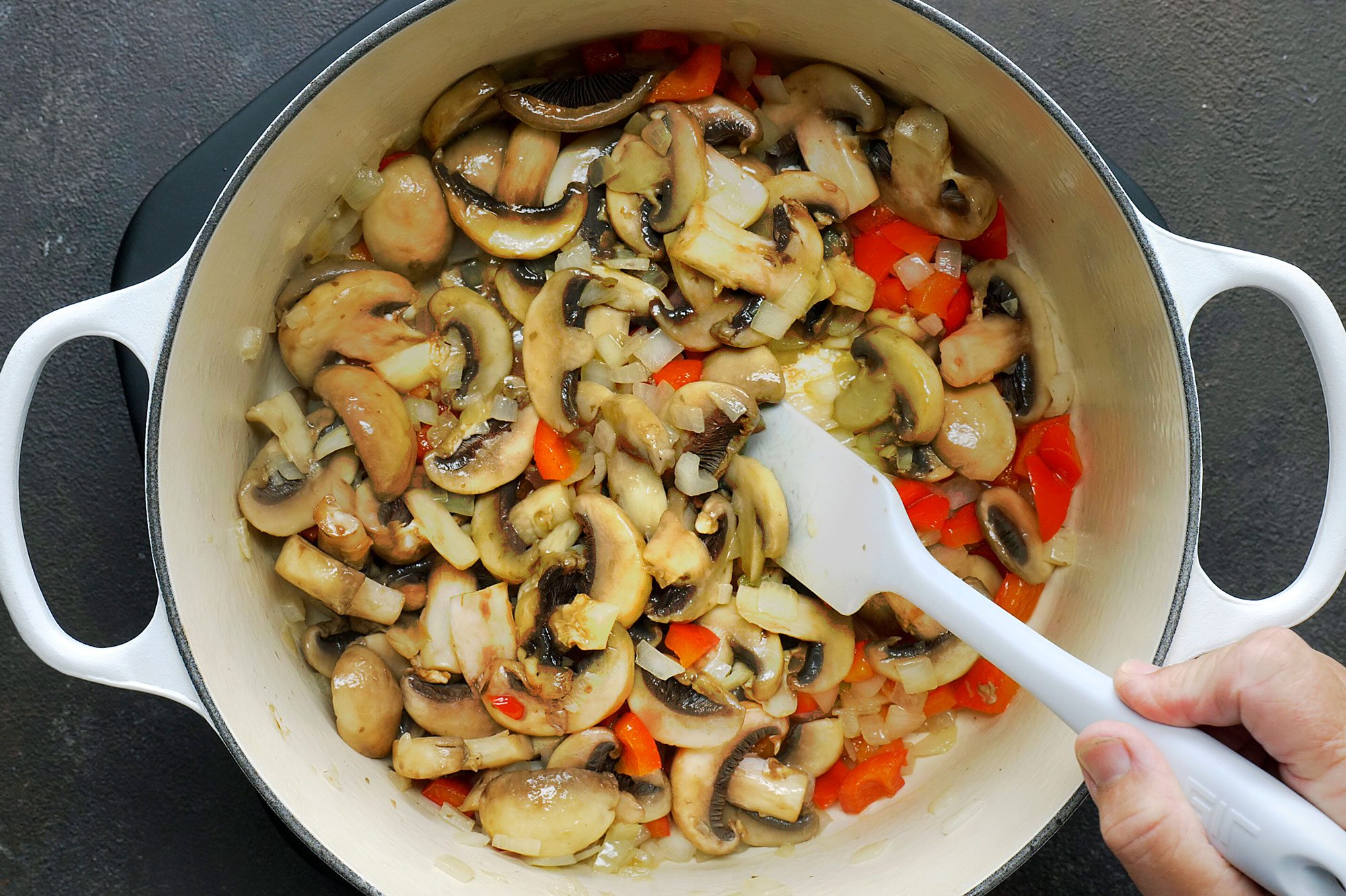 Add mushrooms and red pepper, until tender