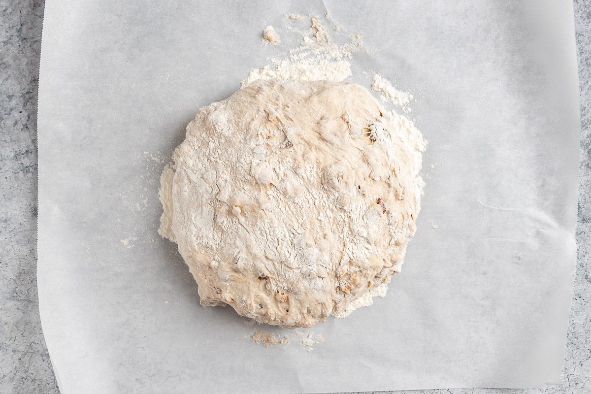 Taste of Home Walnut Raisin Bread photo of the shaped dough on parchment.