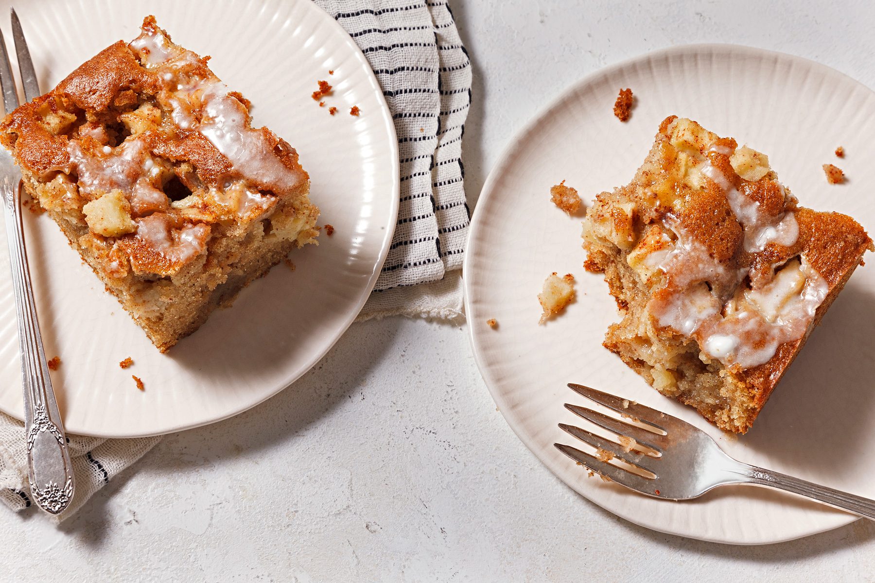 overhead shot of glazed apple fritter cake slice
