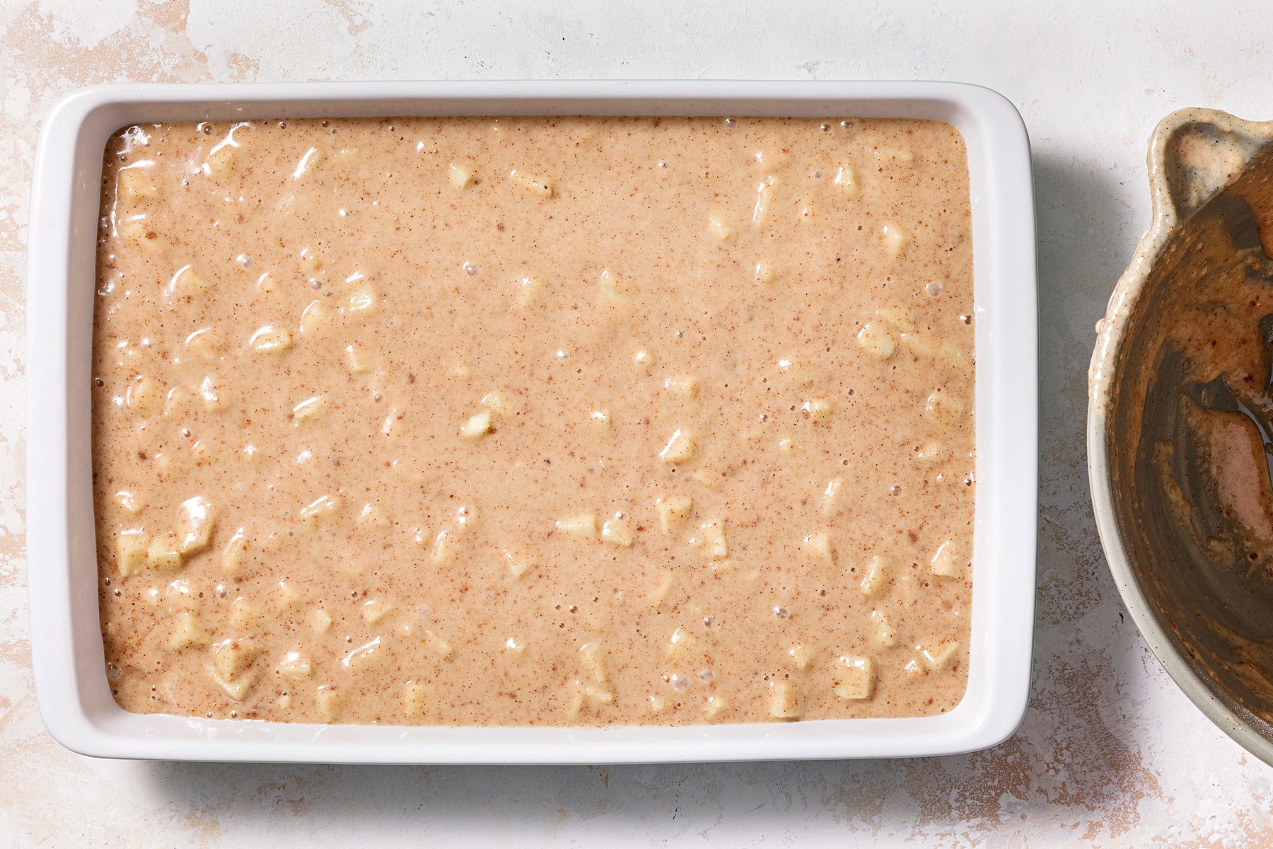 Pour batter into greased 13x9-in. baking dish.