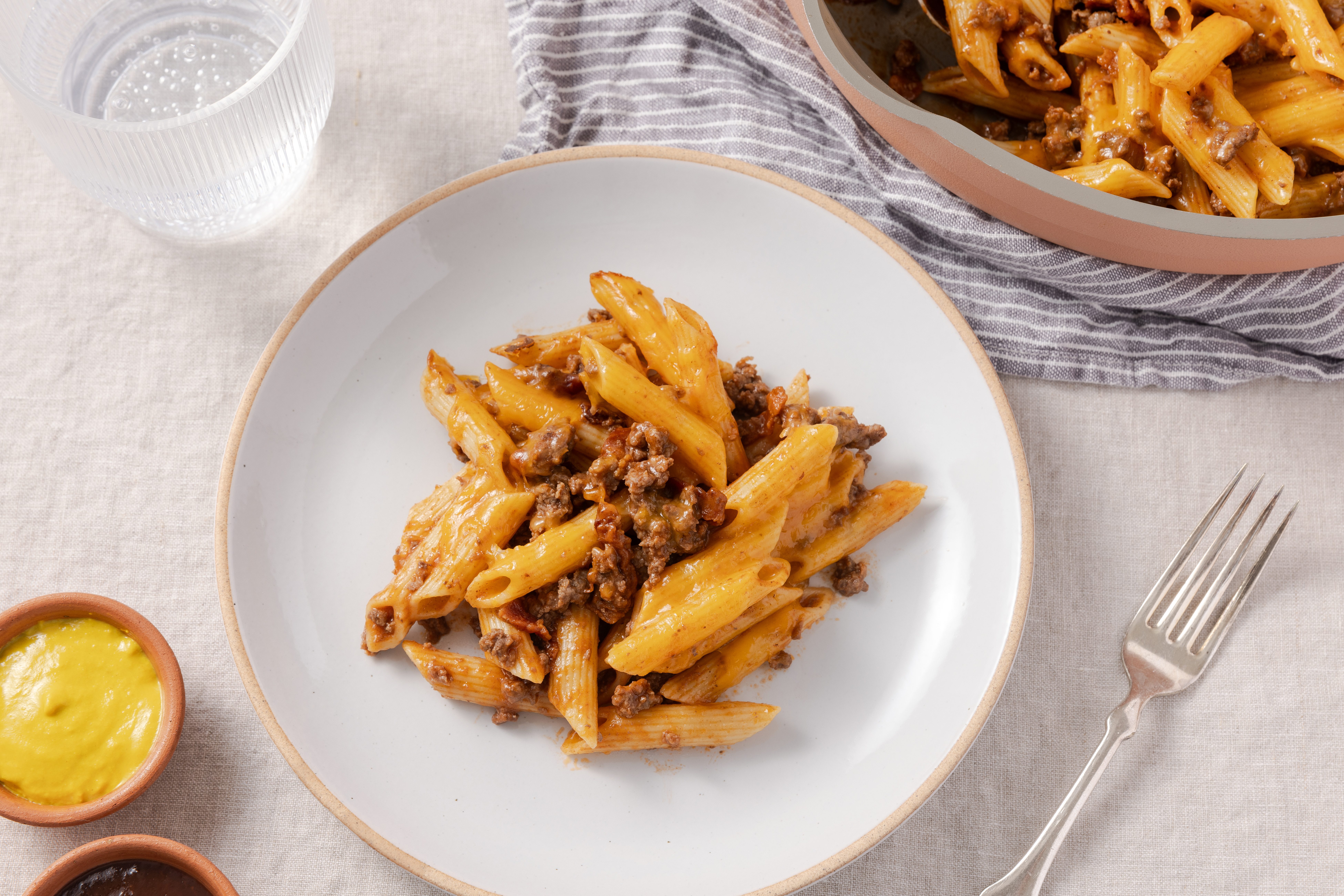 Bacon cheeseburger pasta ready to serve on skillet.