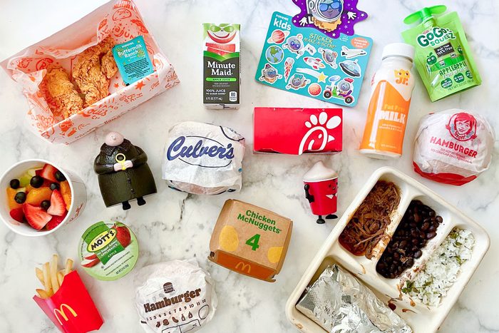 Array of Best Fast Food Kids Meals Items Arranged on Marble Kitchen Counter