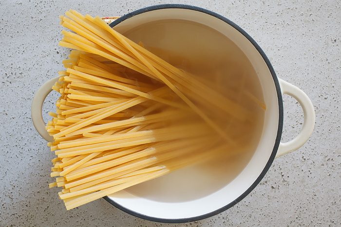 Cooking fettuccini in boiling water