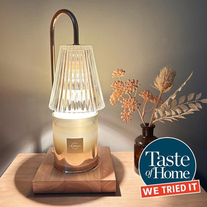 Candle Warmer Glowing On A Bedside Table Ss Edit