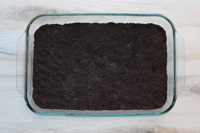 Oreo cookie crumbs form the crust for this layered candy cand dessert.