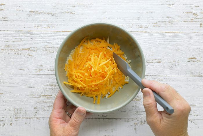 mix cheeses together.