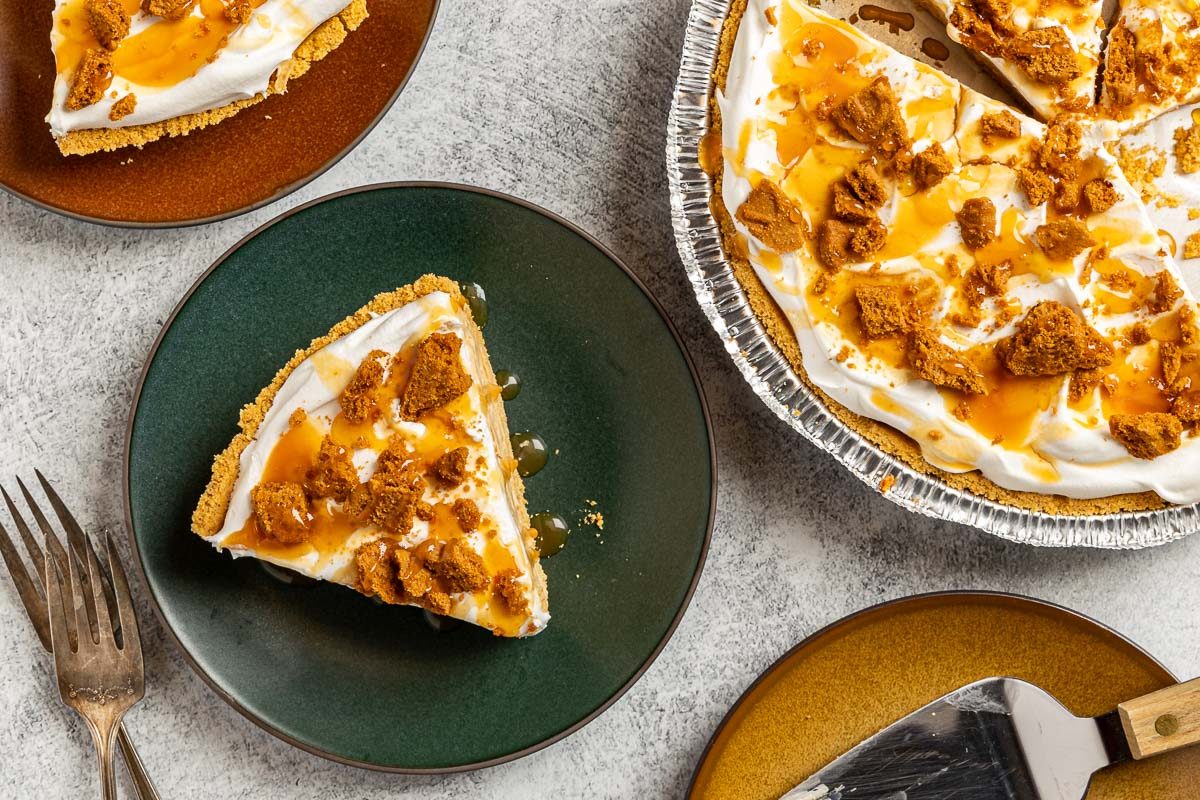 Taste of Home Cookie Butter Pie photo of the finished recipe cut into slices and served on plates.