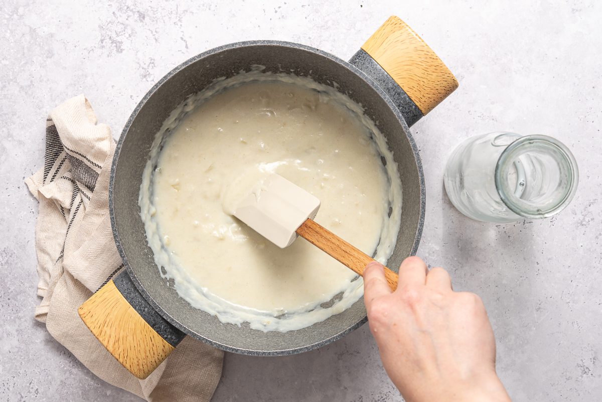 Creamy Onion, Flour, Butter, Milk Mixture Inside Saucepan