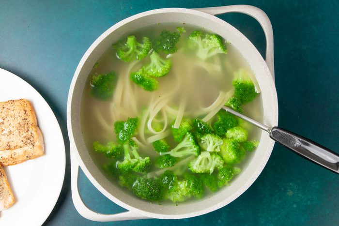 Step 1 of Taste of Home Creamy Salmon Linguine is to boil the pasta and broccoli