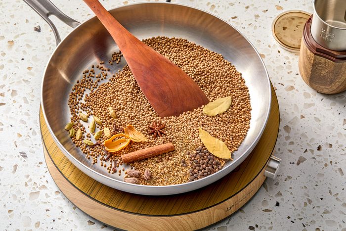 Dry roasting spices in a large skillet