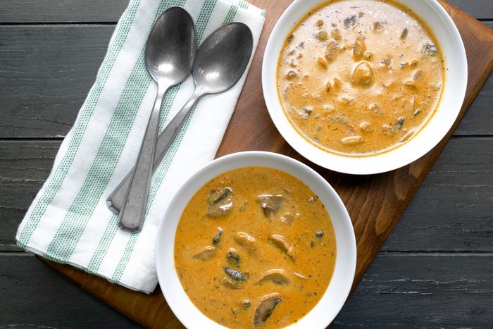 Hungarian Mushroom Soup served in small bowls with spoons on side