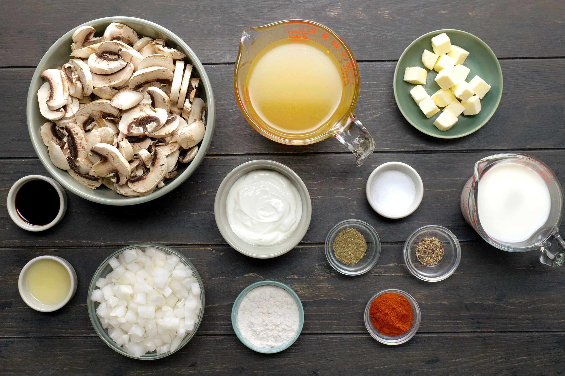 Sweet onion, Butter, Fresh mushrooms, Flour, Paprika, Other seasonings, Chicken broth, Milk, Soy sauce, Sour cream and lemon juice in small bowls