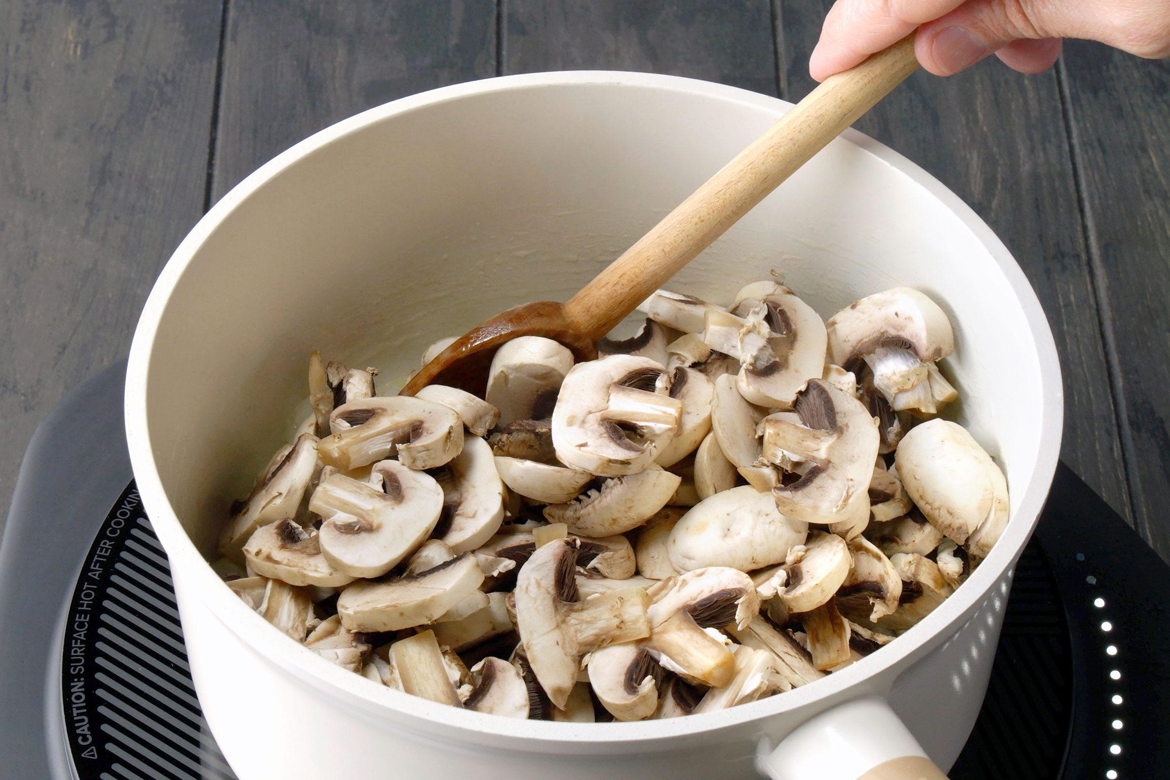 Mushrooms saute in a pan