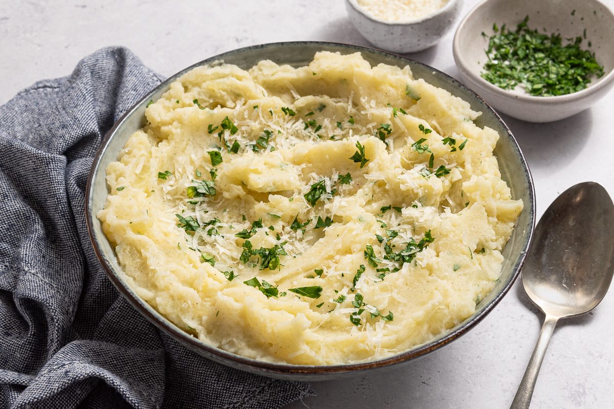 Parmesan Mashed Potatoes In Serving Plate With Parsley