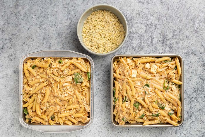 Taste of Home Pesto Chicken Casserole recipe photo of the ingredients in baking dishes.