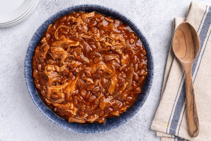 Taste of Home Pork and Beans recipe photo of the finished recipe in a serving bowl.