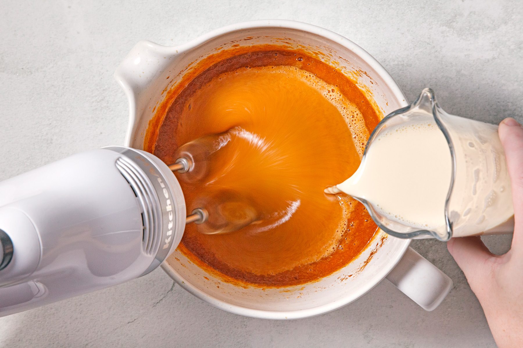 Beat in evaporated milk until smooth.