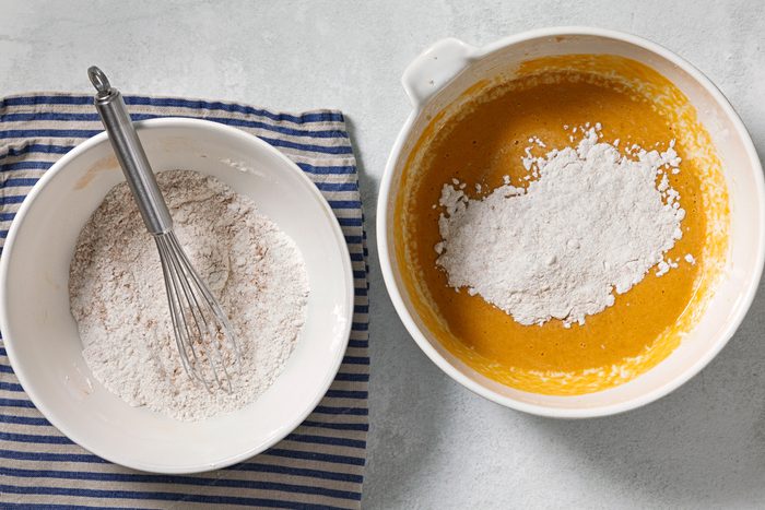 In a separate large bowl, whisk together flour, pumpkin spice, cinnamon, baking powder, baking soda and salt.