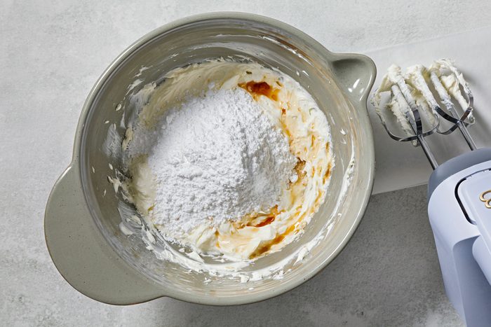 in a large bowl, beat cream cheese and butter on medium speed until smooth.