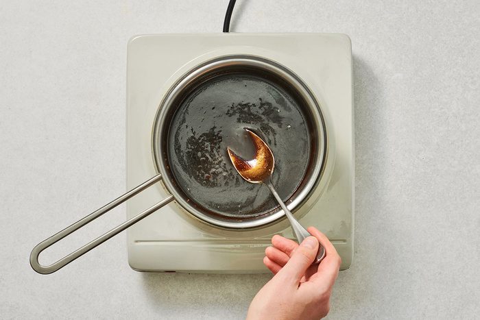 Balsamic reduction simmering in a saucepan